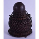 AN EARLY 20TH CENTURY AFRICAN GOURD WATER CARRIER with wicker mounts. 18 cm high.