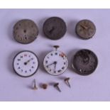 A GROUP OF SIX VINTAGE CIRCULAR ROLEX WATCH DIALS with movements. (6)