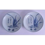 AN UNUSUAL PAIR OF CHINESE TEK SING CARGO SAUCER DISHES painted with floral sprays and