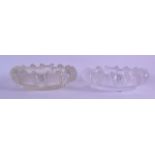 A PAIR OF LALIQUE FROSTED GLASS BOWLS with bold ridged decoration. 19 cm wide.