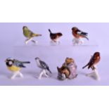 A GROUP OF SIX GOEBEL BIRDS together with a Beatrix Pottery gold stamp figure of Mr Jackson. (7)