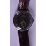 A GENTLEMANS TISSOT ANTI MAGNETIC WRISTWATCH with dark dial and gilt numerals. 3 cm diameter.