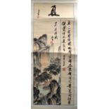 A CHINESE INKWORK SCROLL painted with landscapes.