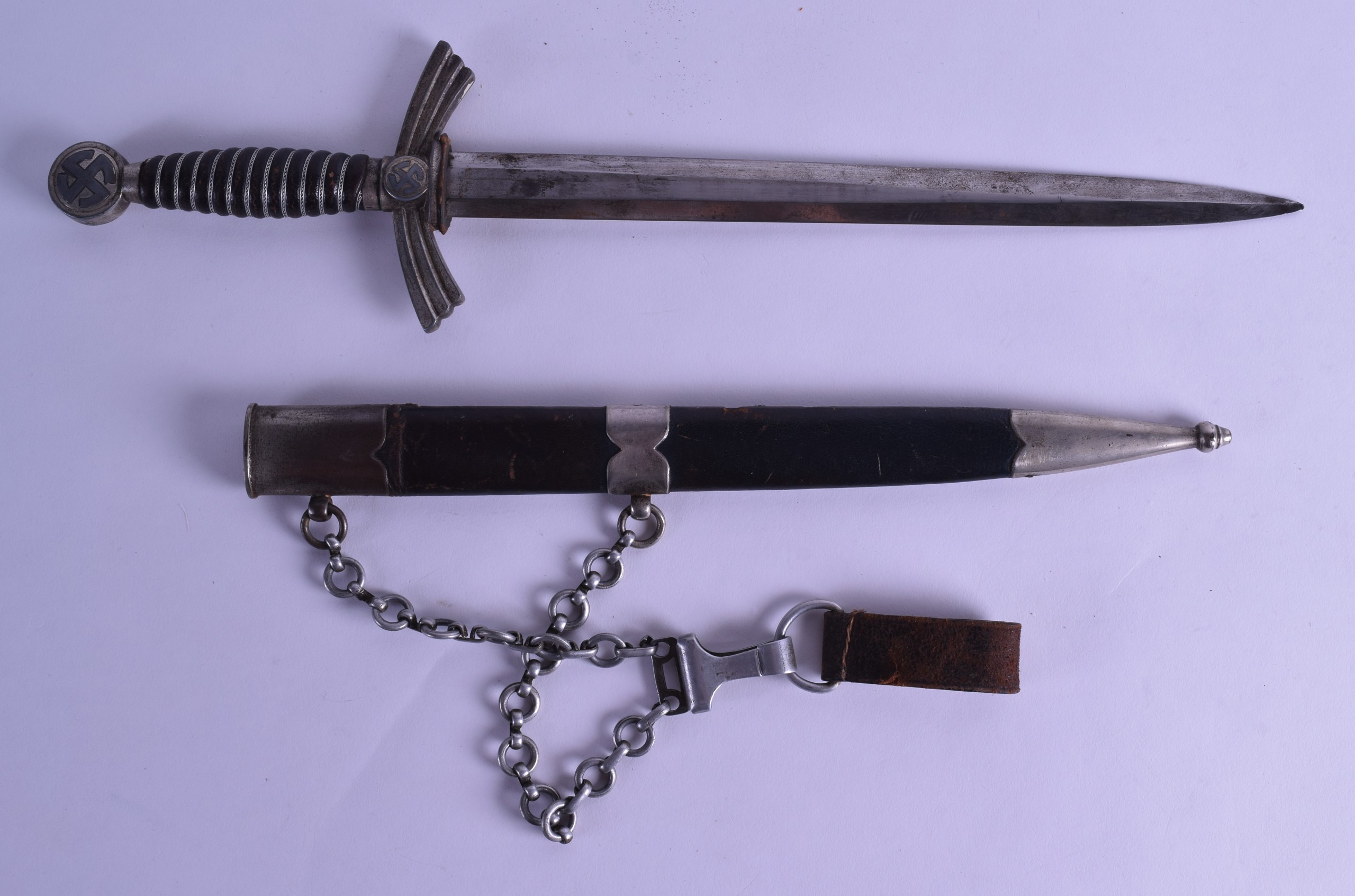 A WWII GERMAN DAGGER the blade stamped Robiklaas Solingen. 48 cm long.