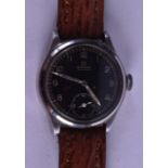 A VINTAGE OMEGA FAB SUISSE WRISTWATCH with black dial. 3 cm diameter.