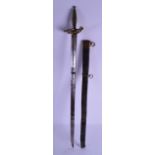 A 19TH CENTURY BRASS BOUND SWORD with leather scabbard. 82 cm long.