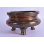 A GOOD 18TH/19TH CENTURY CHINESE BRONZE CENSER bearing Xuande marks to base, supported upon three