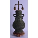 A CHINESE TWIN HANDLED BRONZE VASE converted to a lamp. Vase 30 cm high.