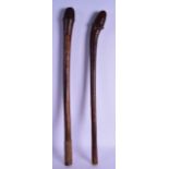A GOOD PAIR OF 19TH CENTURY NEW CALADONIAN OCEANIC HARDWOOD TRIBAL FIGHTING HARDWOOD CLUBS with