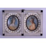 A FRAMED 19TH CENTURY EUROPEAN PAINTED DOUBLE IVORY MINIATURE depicting a male and female within