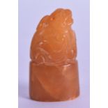 AN EARLY 20TH CENTURY CHINESE CARVED TIANHUANG TYPE HARDSTONE SEAL modelled with a buddhistic