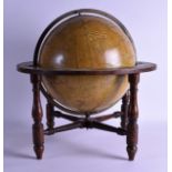 AN ANTIQUE KIRKWOOD'S NEW TERRESTRIAL GLOBE upon a carved wood frame. Globe 26 cm diameter.