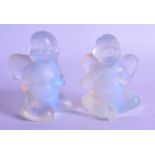 A PAIR OF FRENCH LALIQUE GLASS CHERUBS. 8.5 cm high.