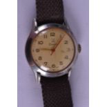 A VINTAGE ZURICH WRISTWATCH with yellow enamelled dial. 3.25 cm wide.