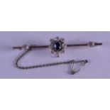 A VICTORIAN WHITE GOLD DIAMOND AND SAPPHIRE BROOCH. 6.8 grams. 5.75 cm wide.