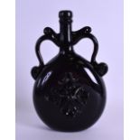 A 1950S TWIN HANDLED DARK AUBERGINE GLASS PILGRIM FLASK decorated with an overlaid motif. 21 cm