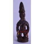 AN EARLY 20TH CENTURY AFRICAN CARVED HARDWOOD FERTILITY FIGURE with bead mounts. 27 cm high.