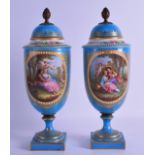A GOOD PAIR OF 19TH CENTURY SEVRES PORCELAIN VASES AND COVERS with jewelled decoration, painted with