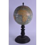 AN ANTIQUE GLOBE TERRESTRE by J Forest, upon an ebonised base. 34 cm high.