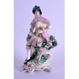 AN 18TH CENTURY DERBY PORCELAIN FIGURE OF A BAGPIPER No 301, modelled beside a recumbent hound, upon