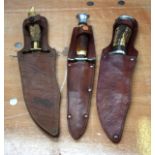 THREE VINTAGE HUNTING KNIVES. (3)