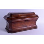 A LARGE VICTORIAN CARVED ROSEWOOD TWIN DIVISION TEA CADDY of rectangular form with canted corners.