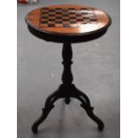 A LOVELY LATE 19TH CENTURY BAVARIAN BLACK FOREST GAMING TABLE with pull out drawer and