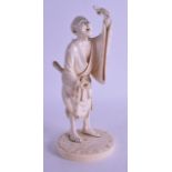 A FINE 19TH CENTURY JAPANESE MEIJI PERIOD CARVED IVORY OKIMONO modelled as a male holding aloft a