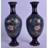 A PAIR OF EARLY 20TH CENTURY JAPANESE MEIJI PERIOD CLOISONNE ENAMEL VASES decorated with birds,