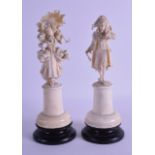 A FINE PAIR OF 19TH CENTURY DIEPPE CARVED IVORY FIGURES depicting a classical male and female upon