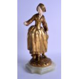 AN ART NOUVEAU GILT BRONZE CARVED IVORY AND ONYX FIGURE OF A FEMALE modelled with one hand within