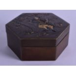 A 19TH CENTURY JAPANESE MEIJI PERIOD ONLAID BRONZE BOX AND COVER decorated with a samurai within a