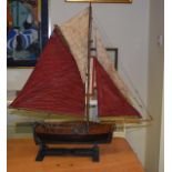 A VINTAGE SAILOR MADE BOAT with rigging and sails. 76 cm wide.