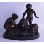 A CONTEMPORARY BRONZE FIGURE OF THREE BOYS modelled building a sandcastle. 32 cm wide.