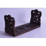 A LATE 19TH CENTURY SOUTH EAST ASIAN CARVED WOOD SLIDING BOOK ENDS with pierced floral panels. 34 cm