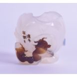 AN UNUSUAL CHINESE CARVED AGATE BRUSH WASHER of naturalistic form, overlaid with two catfish.