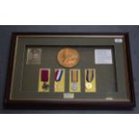 A REPRODUCTION WWI VC DISPLAY MEDAL SET including death plaque.