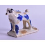 A RARE 18TH/19TH CENTURY CONTINENTAL SPONGEWARE WHISTLE in the form of a standing hound. 9 cm wide.