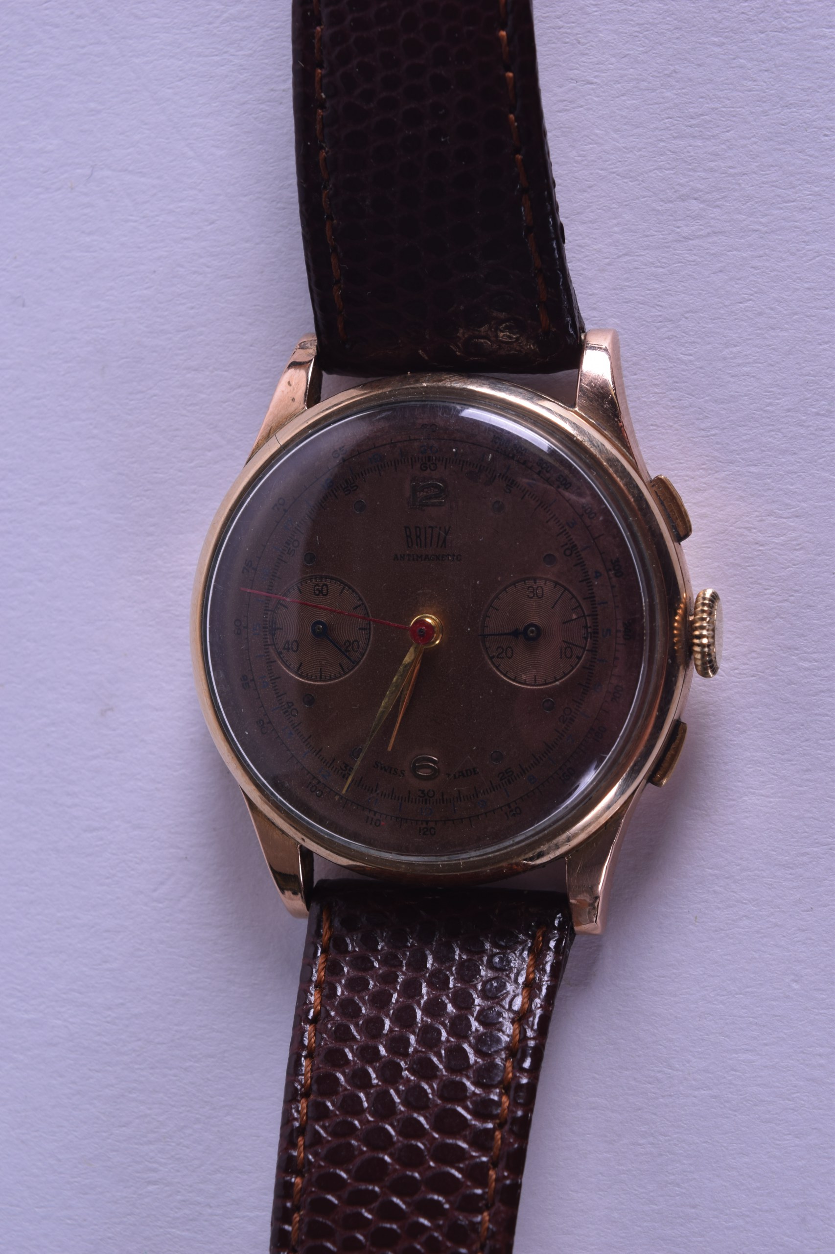 A VINTAGE 18CT YELLOW GOLD BRITIX AUTOMATIC GENTLEMANS WRISTWATCH. 3.5 cm diameter.