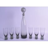 A HOLMEGAARD DECANTER AND STOPPER with six matching Aristocrat glasses. 36.5 cm & 11.5 cm high. (7)