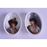 A PAIR OF EARLY 20TH CENTURY GERMAN PORCELAIN OVAL DISHES painted with pretty portraits. 11.25 cm