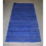 A SOUTH AMERICAN PERUVIAN SURI ALPACA BLUE DYED THICK KNOT REVERSABLR RUG. 6 ft. 5 ins x 3 ft. 1