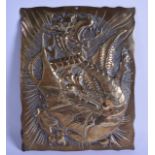 AN ART NOUVEAU EMBOSSED BRASS PANEL depicting a dragon with claws raised. 20 cm x 26 cm.