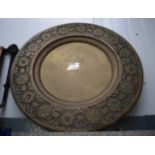 A LARGE ANTIQUE CIRCULAR BRASS CHARGER. 76 cm diameter.