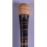 A 19TH CENTURY CARVED EUROPEAN MULTI SECTION HORN AND IVORY WALKING CANE. 79 cm long.