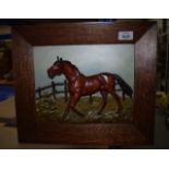 AN ANTIQUE EUROPEAN COLD PAINTED METAL PANEL depicting a horse roaming within a landscape. Signed.