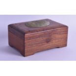 AN EARLY 20TH CENTURY CHINESE CARVED HARDWOOD & JADE RECTANGULAR BOX AND COVER carved with