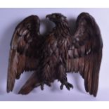 A LARGE 19TH CENTURY BAVARIAN BLACK FOREST CARVED WALL HANGING EAGLE boldly modelled with