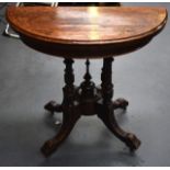A VICTORIAN BURR WALNUT FOLD OVER TEA/GAMING TABLE with scrolling supports. 86 cm x 72 cm