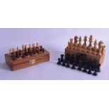 A CASED TRAVELLING CARVED WOOD CHESS SET together with another vintage chess set. (2)